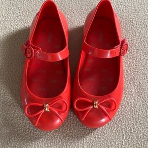 Mini Melissa ballerina shoes.